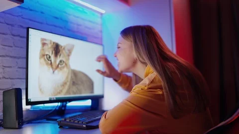 Young girl looking at the screen of a computer Stock Footage 125894403