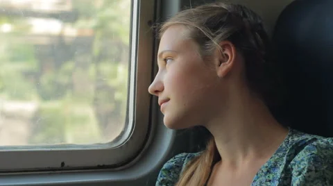 Young Girl Looking Through Window On Train Hd Stock Footage 46447462