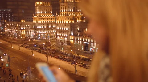 Young girl looks at mobile phone applications and look photos closeup. Stock Footage 59331863