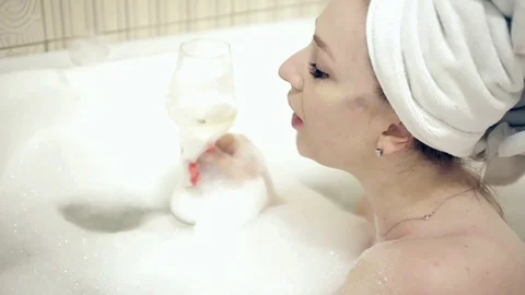 Young woman taking a bath - Free Stock Video