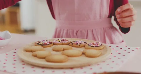 Young girl making sweets in the kitchen Stock Footage 239408317