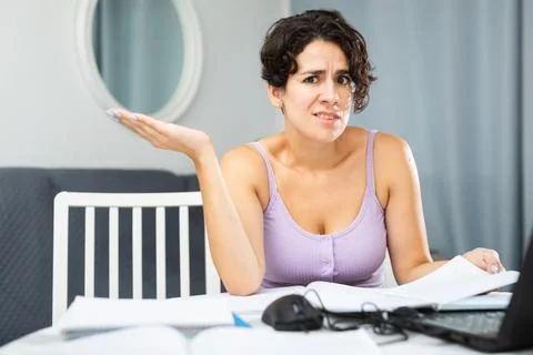 Young girl manager has problems and stress during work at laptop Stock-Fotos