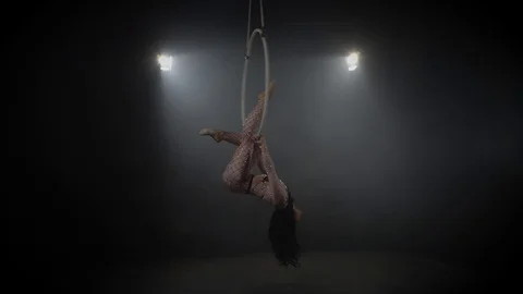Young girl performs the acrobatic elements in the air ring 005 Stock Footage 108780723