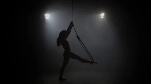 Young girl performs the acrobatic elements in the air ring 008 Stock Footage 108781341