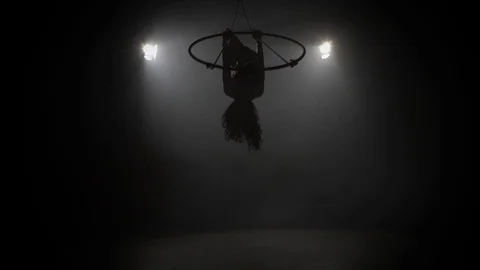 Young girl performs the acrobatic elements in the air ring 009 Stock Footage 108781466