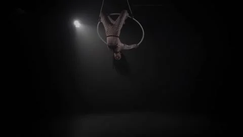 Young girl performs the acrobatic elements in the air ring. Slow motion. 017 Stock Footage 110628704