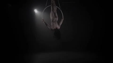 Young girl performs the acrobatic elements in the air ring. Slow motion. 018 Stock Footage 110628721