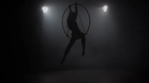 Young girl performs the acrobatic elements in the air ring. Slow motion. 021 Stock Footage 110628770