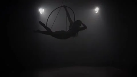 Young girl performs the acrobatic elements in the air ring. Slow motion. 023 Stock Footage 110628798