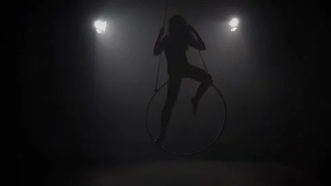 Young girl performs the acrobatic elements in the air ring. Slow motion. 024 Stock Footage 110628822