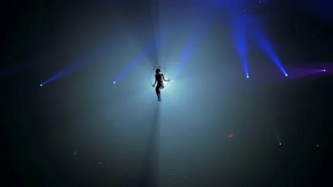 Young girl performs the acrobatic elements in the air ring Stock Footage 149181843