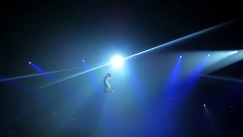 Young girl performs the acrobatic elements in the air ring Stock Footage 149181876