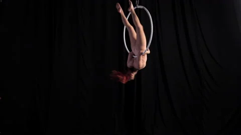 Young girl performs sensual dance on an air ring. circus artist, aerialist Stock Footage 158125047
