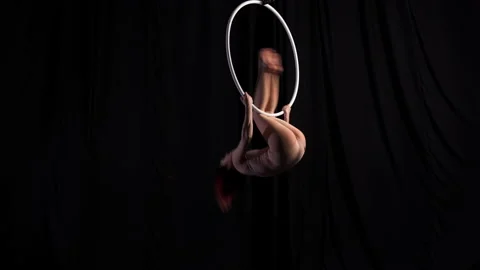 Young girl performs sensual dance on an air ring. circus artist, aerialist Stock Footage 158126433
