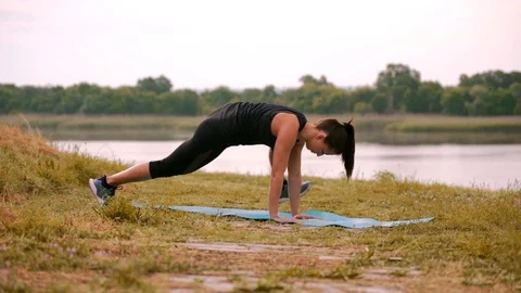 Young girl performs sport Stock Footage 110842453