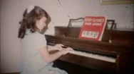 Young Girl Plays The Piano At Home For Family 1950S Vintage Film Home Movie 5411 Stock Footage