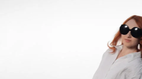 Young girl posing in funny glasses Video stock 34367183