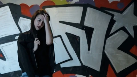 Young girl posing in the underpass. 動画素材 85074669