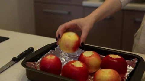 Young Girl Preparing Apples in the Kitchen Stock Footage 61137375