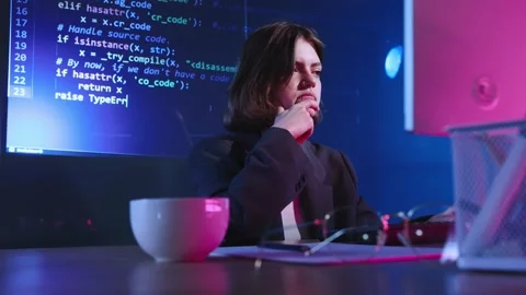 Young girl, programmer, software developer working with computer, writing Stock Footage 245344955