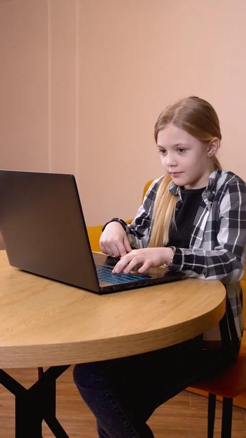 Young girl programming on laptop: multiple shots 스톡 동영상 315881411