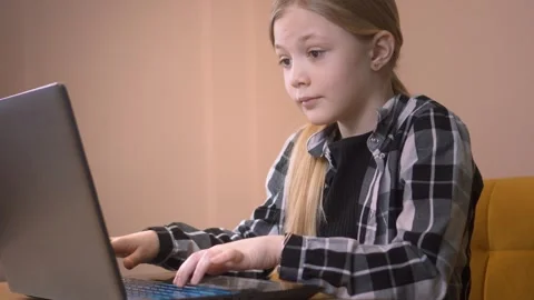 Young girl programming website code on laptop Stock Footage 315878153