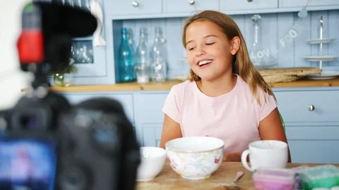 Young Girl Recording Vlog At Home Showing How To Make Slime Stock Footage
