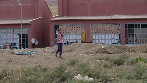 A young girl in a refugee camp Video stock 72332953