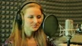The young girl sings in the profi audio studio HD Footage