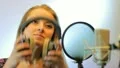 The young girl sings in the profi audio studio HD Footage