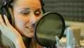 The young girl sings in the profi audio studio HD Footage