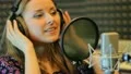 The young girl sings in the profi audio studio HD Footage