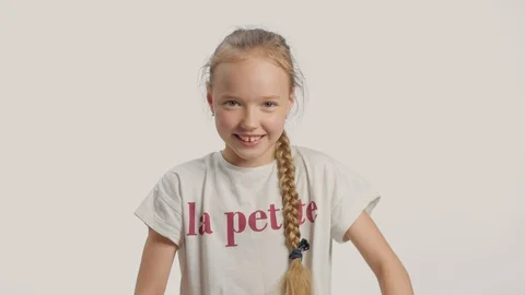Young girl in studio making faces and have fun Stock Footage 112516669