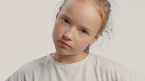 Young girl in studio making faces and have fun Stock Footage 112517190
