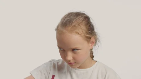 Young girl in studio making faces and have fun Stock Footage 112517706