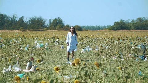 Young Girl Surrounded By Garbage Dump Plastic Bags Stock Footage 116201808