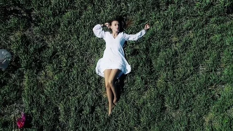 Young Girl Surrounded By Garbage Dump Plastic Bags. Aerial View Stock Footage 116201949