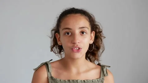 Young girl talking to the camera Stock Footage 138739609