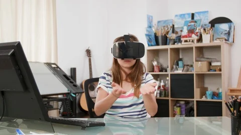 Young girl using educational software for her VR to learn new things Stock Footage 107584977