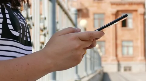 Young Girl Using her Mobile Phone Stock Footage 56594494