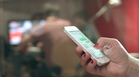 Young girl using his iPhone. Stock Footage 62955341