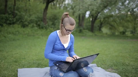 Young Girl Using Internet With Laptop Stock Footage 62844933