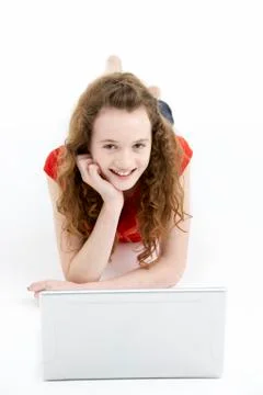 Young Girl Using Laptop Computer Stock Photos
