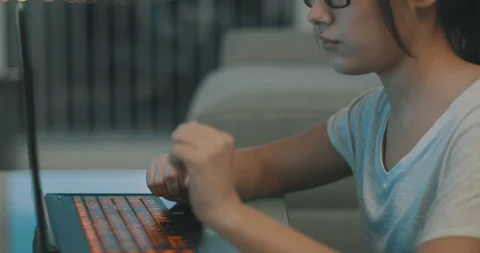 YOUNG GIRL USING LAPTOP Video stock 101030594