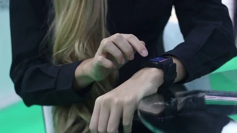Young girl using modern smart watch Stock Footage 73425800