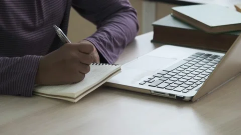 Young girl using notebook computer to study online. Stock Footage 164352020