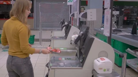 Young girl using pos terminal at the shop (paying credit card for purchases Stock Footage 75346433