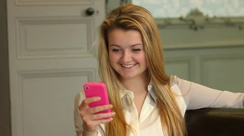 Young girl using smartphone Stock Footage 56456989