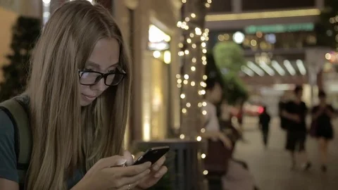 Young Girl Using Smartphone Stock Footage 70841632