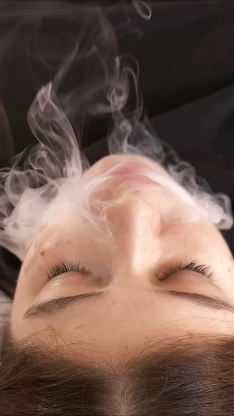 girls exhaling cigarette smoke Woman smoking tobacco hi-res stock photography and images Girl Exhaling Smoke: Over 2,668